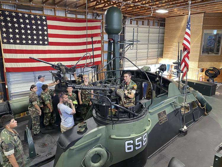 Lewis & Clark Young Marines toured the historic PT Boat 658 and LCI 713, learning about their significant roles in WWII.